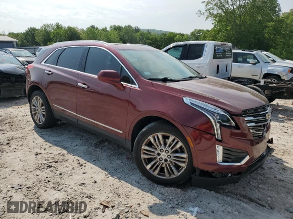 2017 Cadillac XT5 Premium Luxury AWD with VIN 1GYKNERS1HZ112898, listed as a Copart auction lot 58984795 with 140,803 mi miles and Salvage title. Bid and sale history available at DreamBid. Image 4.