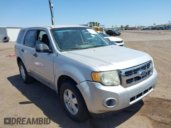2009 Ford Escape XLS with VIN 1FMCU02749KC57784, listed as a IAAI auction lot 41981387 with 216,935 mi miles and . Bid and sale history available at DreamBid. Image 1.