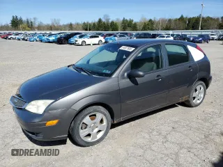 2005 Ford Focus S z VIN 3FAFP37N25R133770, wystawiony jako Copart lot #54927585 z przebiegiem 179 959 mil mil oraz Nie do naprawy. Historia ofert i sprzedaży dostępna na DreamBid. Obrazek 1.