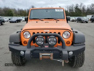 2013 Jeep Wrangler Unlimited Sport z VIN 1C4BJWDG7DL522421, wystawiony jako Copart lot #73010024 z przebiegiem 55 915 mil mil oraz Tytuł czysty. Historia ofert i sprzedaży dostępna na DreamBid. Obrazek 5.