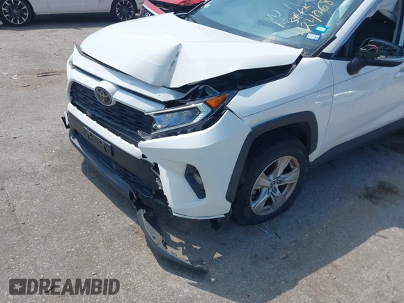 2021 Toyota RAV4 XLE with VIN JTMW1RFV2MD063839, listed as a IAAI auction lot 42406891 with 69,490 mi miles and . Bid and sale history available at DreamBid. Image 6.