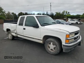 1998 Chevrolet Silverado 1500 with VIN 2GCEC19R6W1133606, listed as a Copart auction lot 54662775 with 317,437 mi miles and Salvage Title. Bid and sale history available at DreamBid. Image 4.