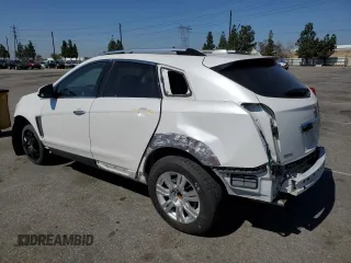 2015 Cadillac SRX Luxury Collection z VIN 3GYFNBE31FS634519, wystawiony jako Copart lot #57292645 z przebiegiem 93 777 mil mil oraz Szkody całkowita. Historia ofert i sprzedaży dostępna na DreamBid. Obrazek 2.