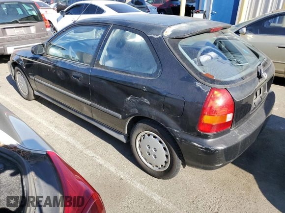 1997 Honda Civic DX with VIN 2HGEJ6344VH119405, listed as a Copart auction lot 71070544 with 26,621 mi miles and Salvage Title. Bid and sale history available at DreamBid. Image 2.
