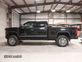 2015 GMC Sierra 2500HD available WiFi Denali with VIN 1GT120E89FF117773, listed as a IAAI auction lot 41587823 with 251,371 mi miles. Bid and sale history available at carsss.com. Image 14.