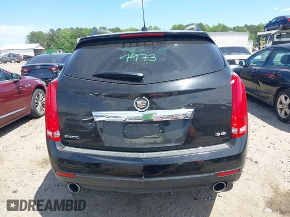 2015 Cadillac SRX Performance Collection with VIN 3GYFNCE30FS549872, listed as a IAAI auction lot 42201529 with 125,128 mi miles and . Bid and sale history available at DreamBid. Image 17.