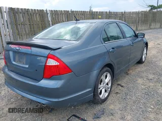 2012 Ford Fusion SE with VIN 3FAHP0HA5CR264255, listed as a IAAI auction lot 42649304 with 127,463 mi miles and . Bid and sale history available at DreamBid. Image 4.