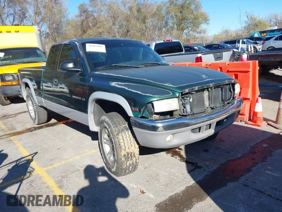 1998 Dodge Dakota SLT with VIN 1B7GG22X3WS573262, listed as a IAAI auction lot 40905093 with 148,684 mi miles and . Bid and sale history available at DreamBid. Image 1.