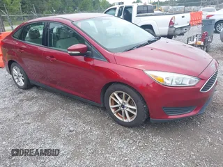 2016 Ford Focus SE z VIN 1FADP3F27GL241382, wystawiony jako IAAI lot #42790565 z przebiegiem 149 762 mil mil oraz . Historia ofert i sprzedaży dostępna na DreamBid. Obrazek 1.