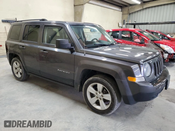 2015 Jeep Patriot Latitude with VIN 1C4NJPFB3FD353256, listed as a Copart auction lot 43928265 with 153,574 mi miles and Salvage Title. Bid and sale history available at DreamBid. Image 4.