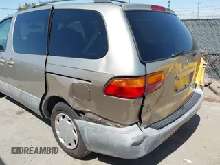 2000 Toyota Sienna LE with VIN 4T3ZF13C9YU201789, listed as a IAAI auction lot 42641248 with 180,781 mi miles and . Bid and sale history available at DreamBid. Image 6.