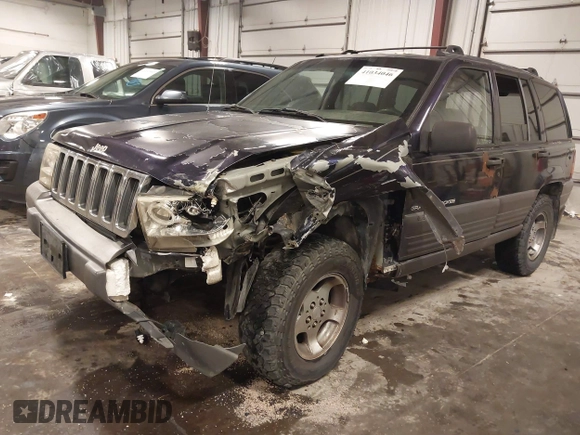 1997 Jeep Grand Cherokee Laredo with VIN 1J4GZ58S8VC675487, listed as a IAAI auction lot 41034046 with 243,284 mi miles. Bid and sale history available at carsss.com. Image 18.