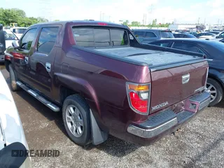 2007 Honda Ridgeline RTL with VIN 2HJYK16587H518901, listed as a IAAI auction lot 42762425 with 206,243 mi miles and . Bid and sale history available at DreamBid. Image 3.