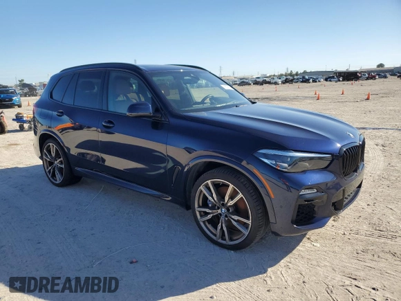2021 BMW X5 M50i with VIN 5UXJU4C06M9F06155, listed as a Copart auction lot 86296724 with 59,608 mi miles and Salvage Title. Bid and sale history available at carsss.com. Image 4.
