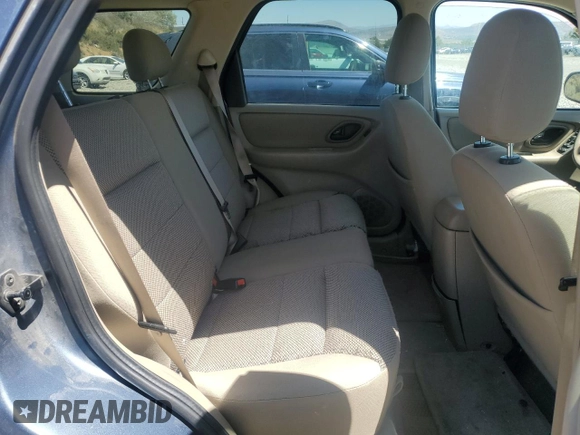 2005 Ford Escape XLT with VIN 1FMCU93105KA43061, listed as a Copart auction lot 62324555 with 121,517 mi miles and Salvage title. Bid and sale history available at DreamBid. Image 10.