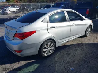 2014 Hyundai Accent GLS with VIN KMHCU4AE3EU603930, listed as a IAAI auction lot 41748640 with 269,813 mi miles. Bid and sale history available at carsss.com. Image 4.