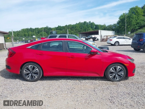 2016 Honda Civic EX-L z VIN 2HGFC1F74GH652090, wystawiony jako IAAI lot #42253881 z przebiegiem 127 863 mil mil oraz . Historia ofert i sprzedaży dostępna na DreamBid. Obrazek 13.