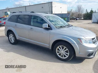 2017 Dodge Journey SXT z VIN 3C4PDDBG6HT595309, wystawiony jako IAAI lot #41918029 z przebiegiem 127 247 mil mil oraz . Historia ofert i sprzedaży dostępna na DreamBid. Obrazek 1.