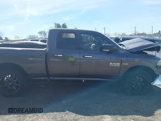 2015 Ram 1500 Big Horn z VIN 1C6RR7GT8FS549293, wystawiony jako IAAI lot #41833000 z przebiegiem Nie podano mil oraz . Historia ofert i sprzedaży dostępna na DreamBid. Obrazek 12.