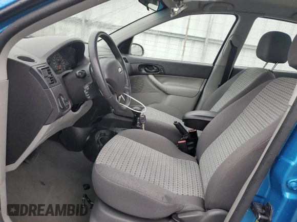 2007 Ford Focus S z VIN 1FAFP34N47W164846, wystawiony jako Copart lot #55587185 z przebiegiem 41 172 mil mil oraz Szkoda całkowita • Salvage title. Historia ofert i sprzedaży dostępna na DreamBid. Obrazek 7.