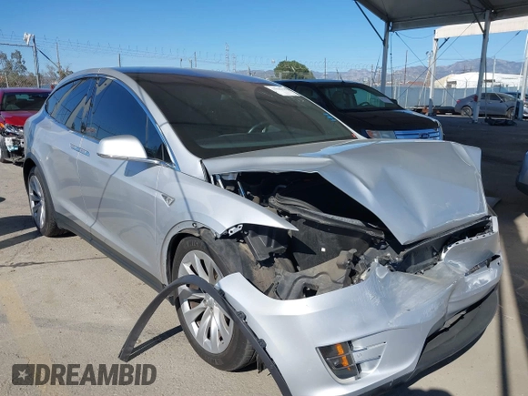 2016 Tesla Model X 70D z VIN 5YJXCBE25GF021322, wystawiony jako IAAI lot #41866368 z przebiegiem 95 072 mil mil oraz . Historia ofert i sprzedaży dostępna na DreamBid. Obrazek 1.