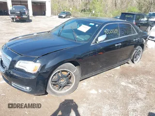 2014 Chrysler 300 C with VIN 2C3CCAKG5EH179583, listed as a IAAI auction lot 42001109 with 148,288 mi miles and . Bid and sale history available at carsss.com. Image 18.