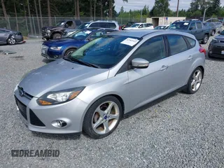 2014 Ford Focus Titanium with VIN 1FADP3N20EL160982, listed as a IAAI auction lot 42565322 with 112,551 mi miles and . Bid and sale history available at DreamBid. Image 2.