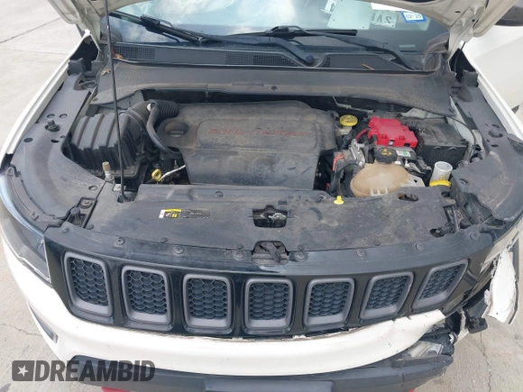 2020 Jeep Compass Trailhawk with VIN 3C4NJDDB3LT118928, listed as a IAAI auction lot 42128120 with 95,477 mi miles and . Bid and sale history available at DreamBid. Image 10.