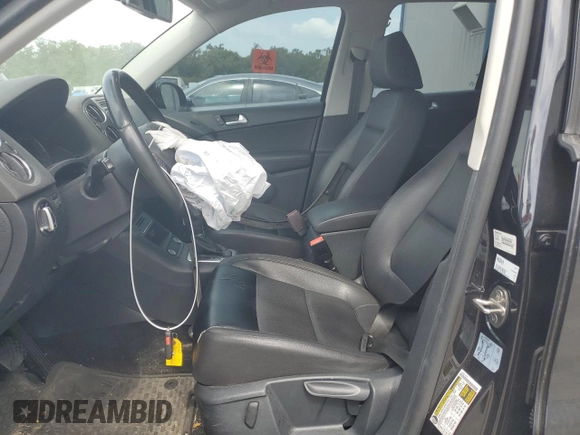 2017 Volkswagen Tiguan S with VIN WVGAV7AX8HK038419, listed as a Copart auction lot 53776155 with 72,006 mi miles and Salvage Title. Bid and sale history available at DreamBid. Image 7.