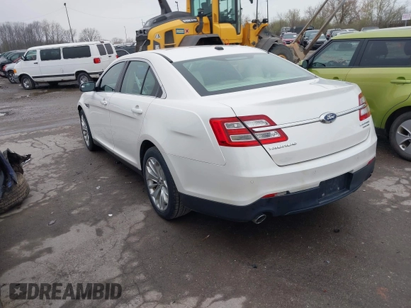 2015 Ford Taurus Limited with VIN 1FAHP2F85FG117635, listed as a IAAI auction lot 41979311 with 104,314 mi miles. Bid and sale history available at carsss.com. Image 3.