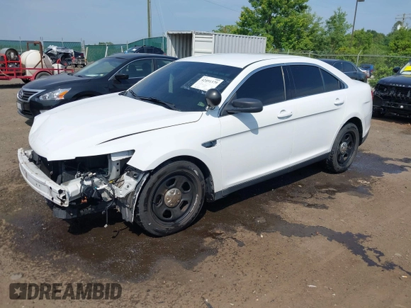 2014 Ford Police Interceptor with VIN 1FAHP2MKXEG100925, listed as a IAAI auction lot 42491379 with 97,937 mi miles and . Bid and sale history available at DreamBid. Image 18.