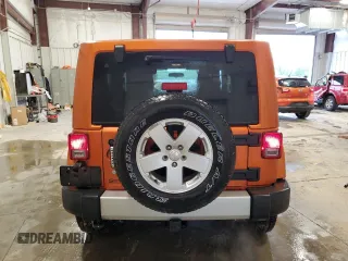 2011 Jeep Wrangler Sahara with VIN 1J4GA5D1XBL557392, listed as a Copart auction lot 56892835 with 109,567 mi miles and Clean title. Bid and sale history available at DreamBid. Image 6.