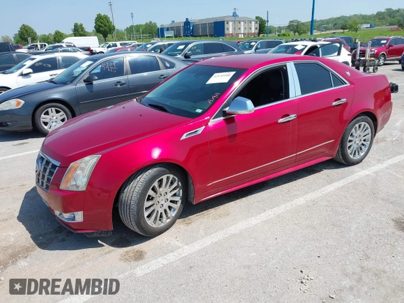 2012 Cadillac CTS Performance with VIN 1G6DJ5E31C0107905, listed as a IAAI auction lot 42131940 with 108,015 mi miles and . Bid and sale history available at DreamBid. Image 2.