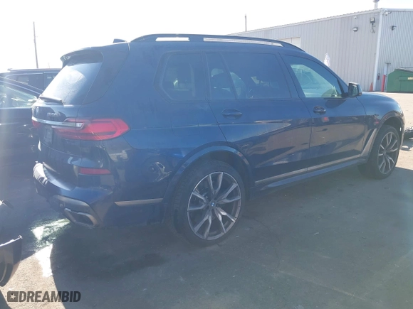 2021 BMW X7 M50i with VIN 5UXCX6C0XM9E15417, listed as a IAAI auction lot 41402910 with 70,768 mi miles. Bid and sale history available at carsss.com. Image 4.