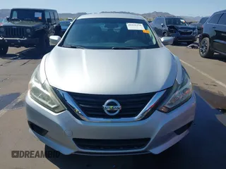 2016 Nissan Altima S with VIN 1N4AL3AP9GN313513, listed as a IAAI auction lot 41959279 with 115,100 mi miles and . Bid and sale history available at DreamBid. Image 13.