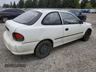 1999 Hyundai Accent z VIN KMHVD14N9XU503210, wystawiony jako Copart lot #56486325 z przebiegiem 195 501 mil mil oraz Szkody całkowita. Historia ofert i sprzedaży dostępna na DreamBid. Obrazek 3.