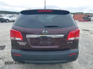2013 Kia Sorento EX with VIN 5XYKU4A21DG312753, listed as a IAAI auction lot 41033124 with 197,459 mi miles and . Bid and sale history available at carsss.com. Image 16.