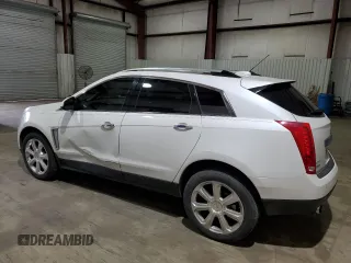 2016 Cadillac SRX Performance Collection with VIN 3GYFNCE36GS525836, listed as a Copart auction lot 84502634 with 94,639 mi miles and Salvage title. Bid and sale history available at DreamBid. Image 2.