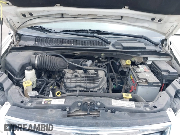 2013 Chrysler Town & Country Touring with VIN 2C4RC1BG4DR648838, listed as a IAAI auction lot 42004977 with 218,814 mi miles. Bid and sale history available at carsss.com. Image 10.