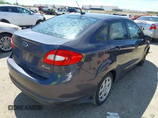 2013 Ford Fiesta S с VIN 3FADP4AJ7DM207683, выставлен на аукционе IAAI как лот 42220602 с пробегом 129 549 миль миль и . История ставок и продаж доступна на DreamBid. Изображение 4.
