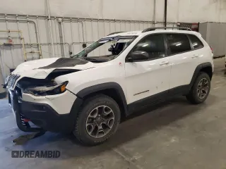 2020 Jeep Cherokee Trailhawk z VIN 1C4PJMBX5LD553785, wystawiony jako Copart lot #59378225 z przebiegiem 41 633 mil mil oraz Czysty tytuł • Clean title. Historia ofert i sprzedaży dostępna na DreamBid. Obrazek 1.