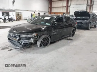 2023 Honda Civic Sport with VIN 2HGFE2F52PH505538, listed as a IAAI auction lot 42447559 with 36,621 mi miles and . Bid and sale history available at DreamBid. Image 19.