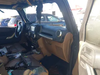 2011 Jeep Wrangler Unlimited Rubicon with VIN 1J4BA6H16BL615945, listed as a IAAI auction lot 42159418 with Not provided miles and . Bid and sale history available at DreamBid. Image 5.