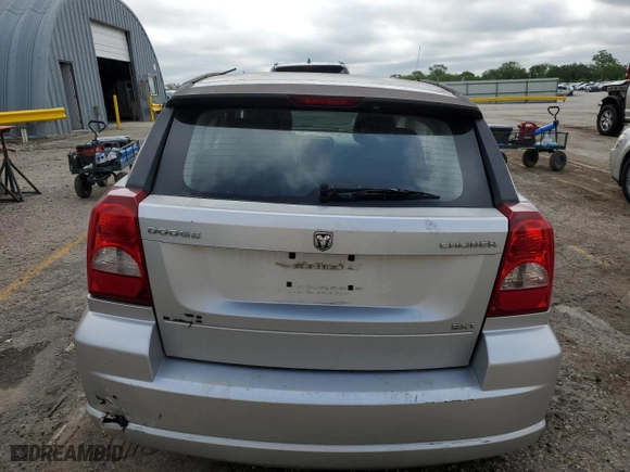 2010 Dodge Caliber SXT with VIN 1B3CB4HA9AD550093, listed as a Copart auction lot 84230604 with 0 mi miles and Salvage Title. Bid and sale history available at carsss.com. Image 6.