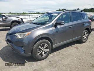 2018 Toyota RAV4 XLE with VIN JTMRFREV2JJ223070, listed as a Copart auction lot 63079945 with 129,614 mi miles and Salvage title. Bid and sale history available at DreamBid. Image 1.