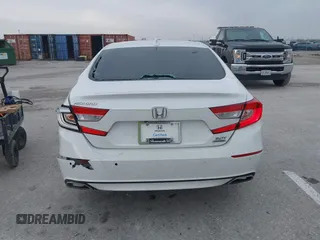 2020 Honda Accord Touring with VIN 1HGCV2F96LA011360, listed as a IAAI auction lot 41192112 with 64,643 mi miles and . Bid and sale history available at DreamBid. Image 17.