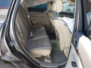 2015 Jeep Grand Cherokee Overland with VIN 1C4RJECT2FC648292, listed as a IAAI auction lot 41806402 with 116,766 mi miles. Bid and sale history available at carsss.com. Image 8.