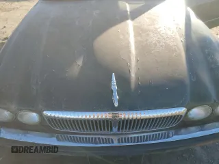 1995 Jaguar XJ with VIN SAJKX1747SC722815, listed as a Copart auction lot 83743934 with Not Provided miles and Clean Title. Bid and sale history available at DreamBid. Image 11.