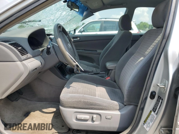 2006 Toyota Camry STD z VIN 4T1BE32K76U115783, wystawiony jako Copart lot #59911675 z przebiegiem 99 981 mil mil oraz Szkoda całkowita • Salvage title. Historia ofert i sprzedaży dostępna na DreamBid. Obrazek 7.