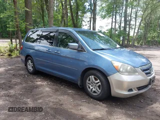2006 Honda Odyssey EX with VIN 5FNRL38426B099308, listed as a IAAI auction lot 42482091 with 190,702 mi miles and . Bid and sale history available at DreamBid. Image 1.